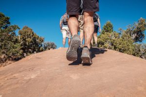 Group of people walking on a trail keeping good health